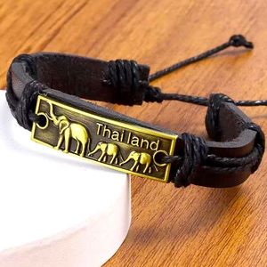 NEW—Leather with gold Thai Land Charm